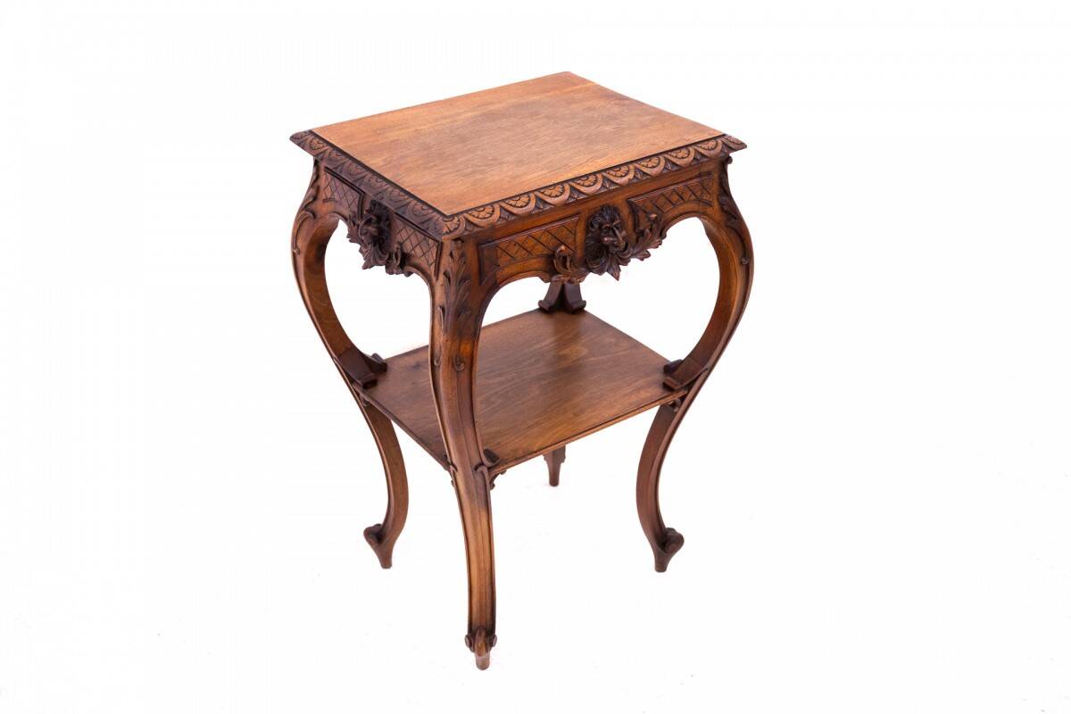 Small table with delicate carving, France, circa 1890.