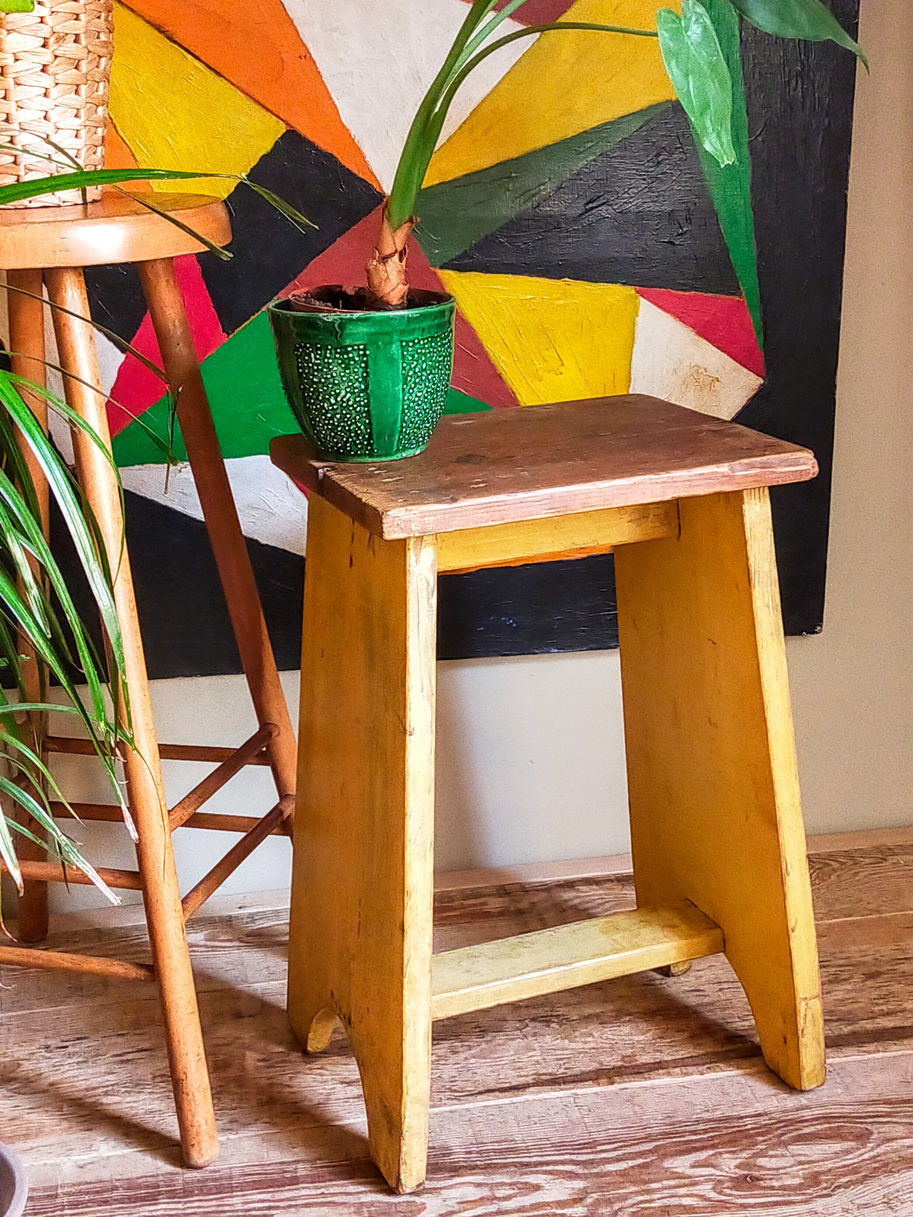 Art-populaire workshop stool in patinated painted wood