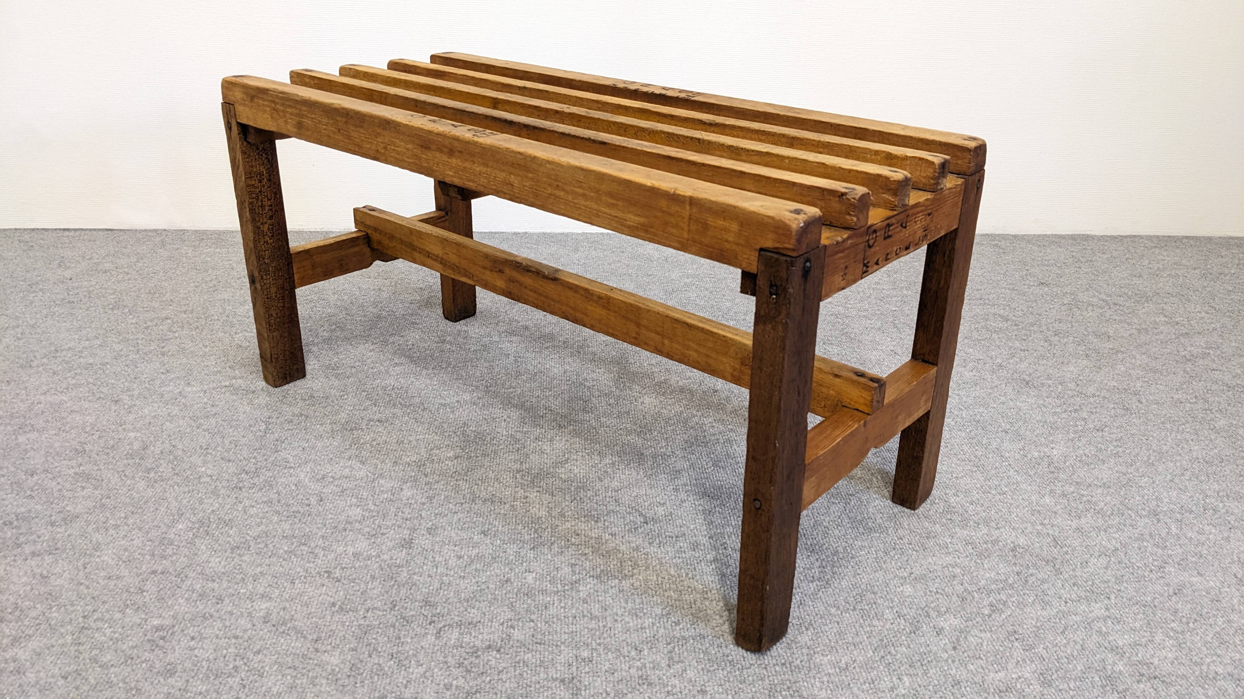 Wooden slatted display bench or support, France circa 1960.