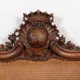 Louis XV style bed in carved and caned beech