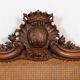 Louis XV style bed in carved and caned beech
