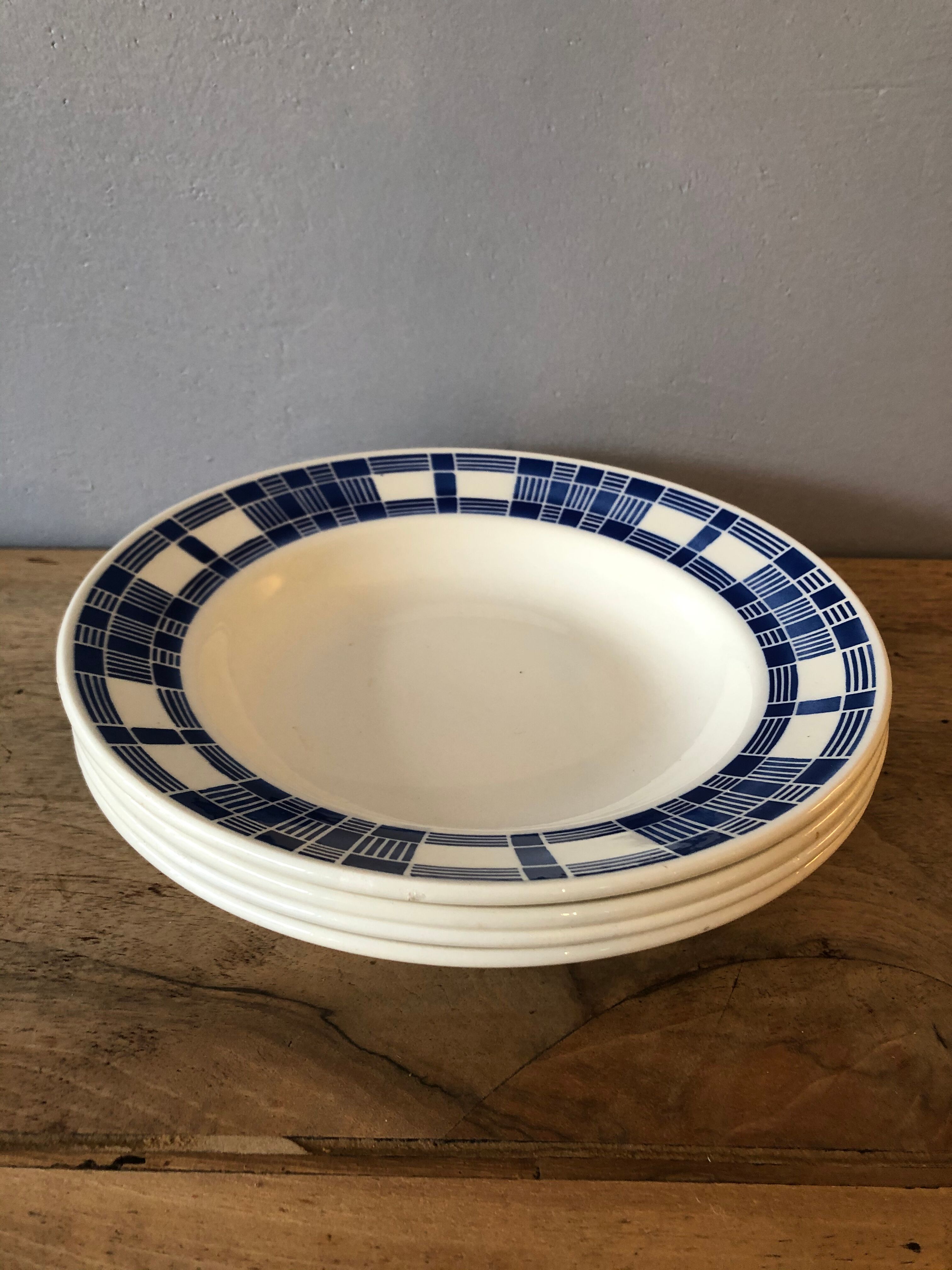 4 hollow plates made of ancient earthenware