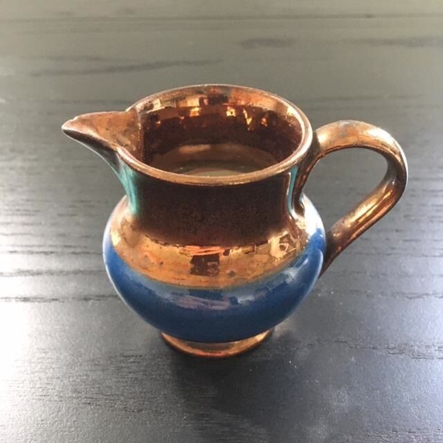 Two-tone copper and blue pitcher