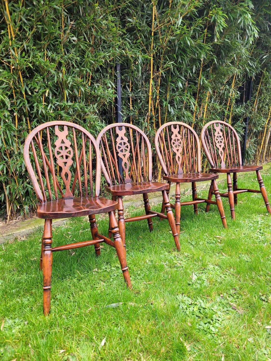 4 Windsor wheelback chairs in dark oak