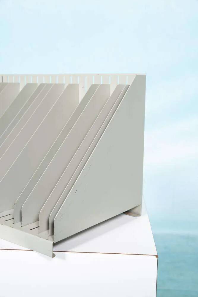 Vintage 1960s metal magazine rack, storage for single LPs.