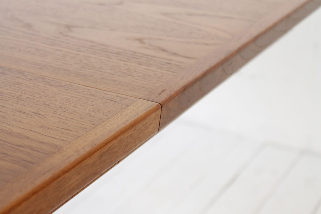 Square teak dining table