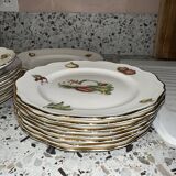 Set of 8 flat plates, 8 deep plates and one L’amandinoise vegetable dish.