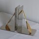 Pair of bookends, tennis racket.