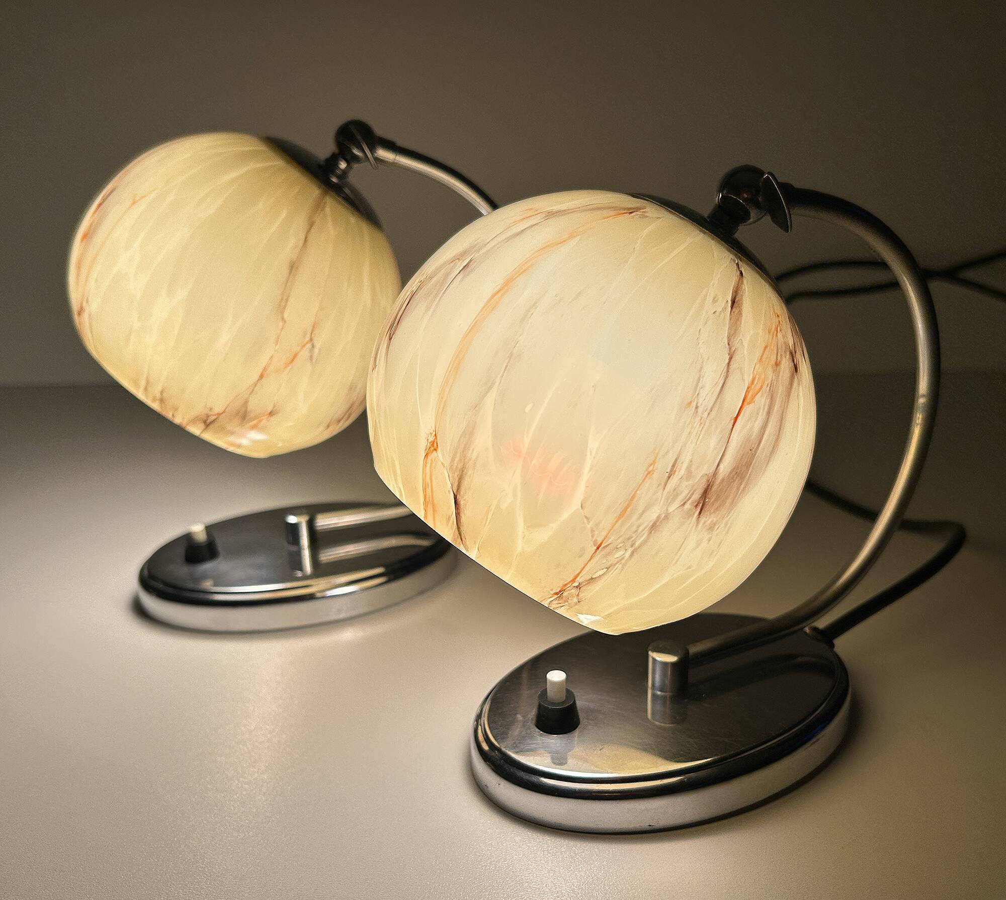 Pair of art deco lamps, chrome glass