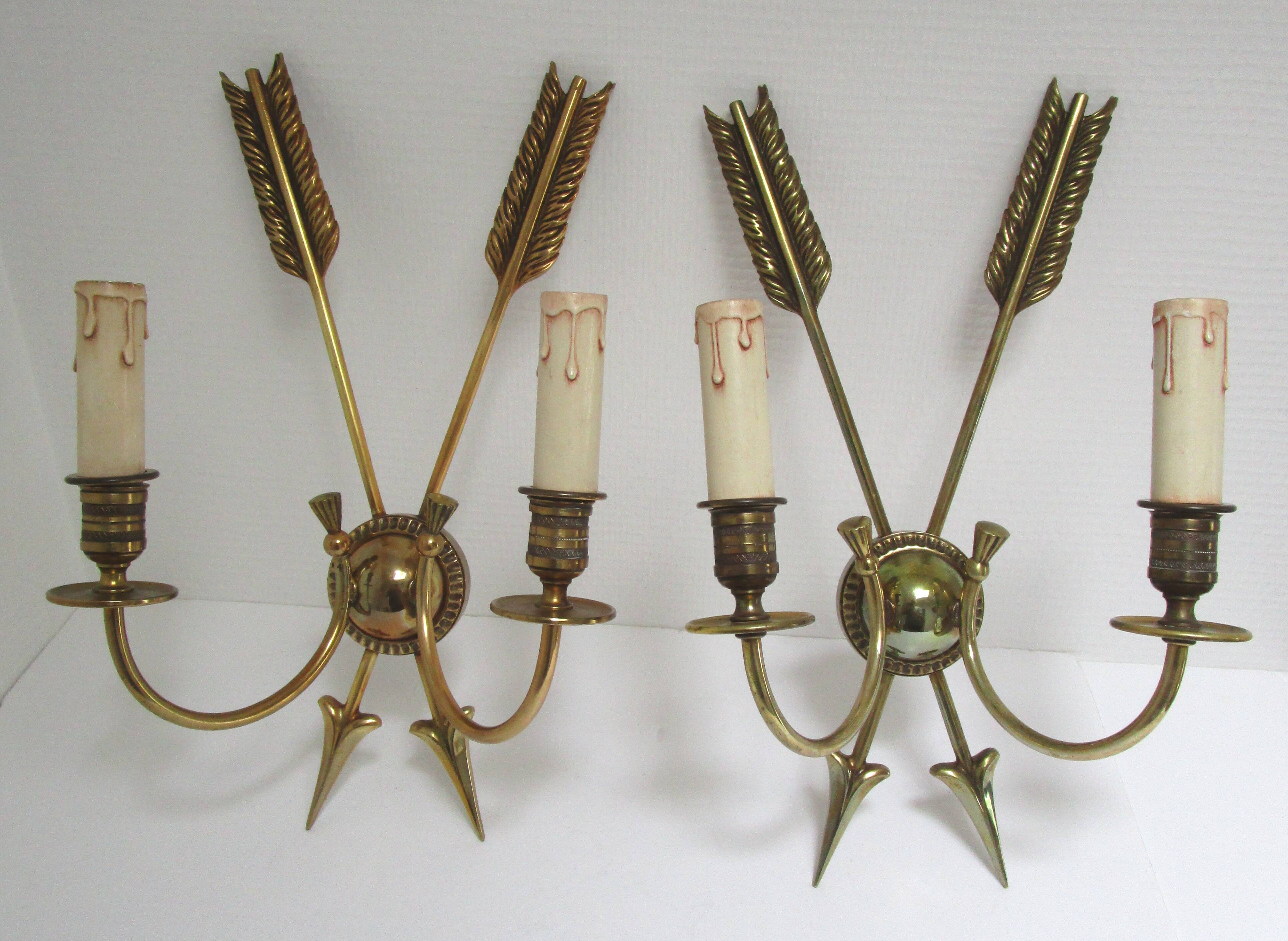 Pair of bronze crossed arrow wall lights Lucien Gau