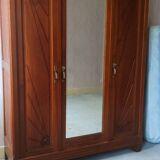 Old art nouveau 3-door wardrobe with mercury mirror