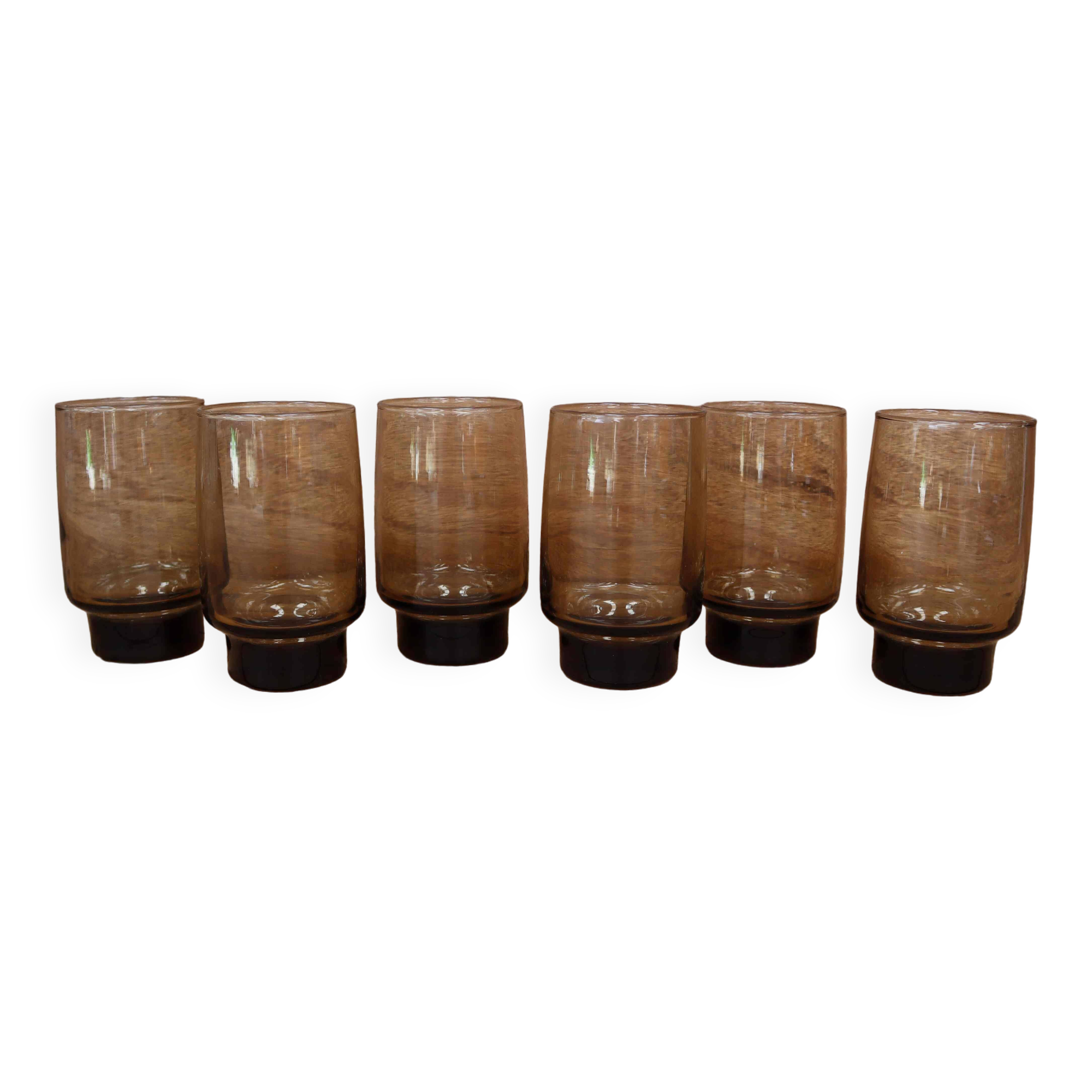 6 Smoked glasses with thick legs from the 70s
