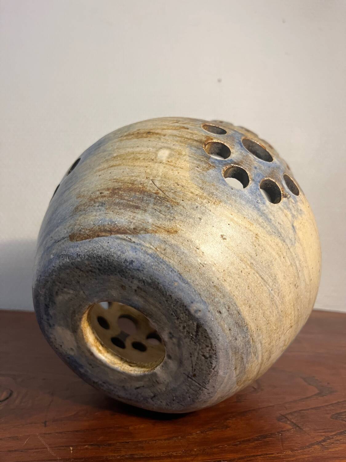 Ceramic suspension with openings