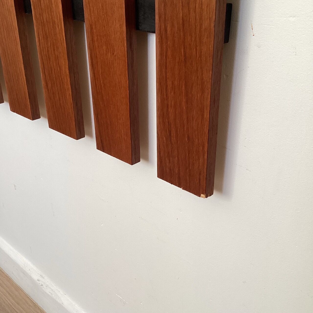 Wooden wall coat rack