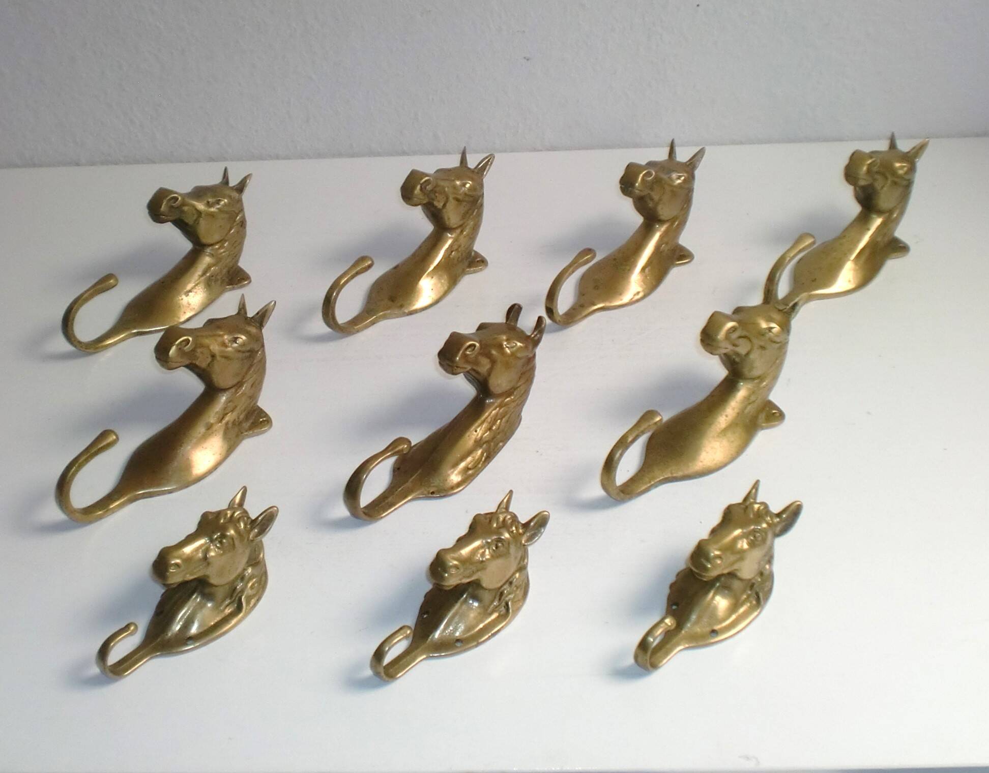 Set of 10 heavy brass horse coat rack wall hooks