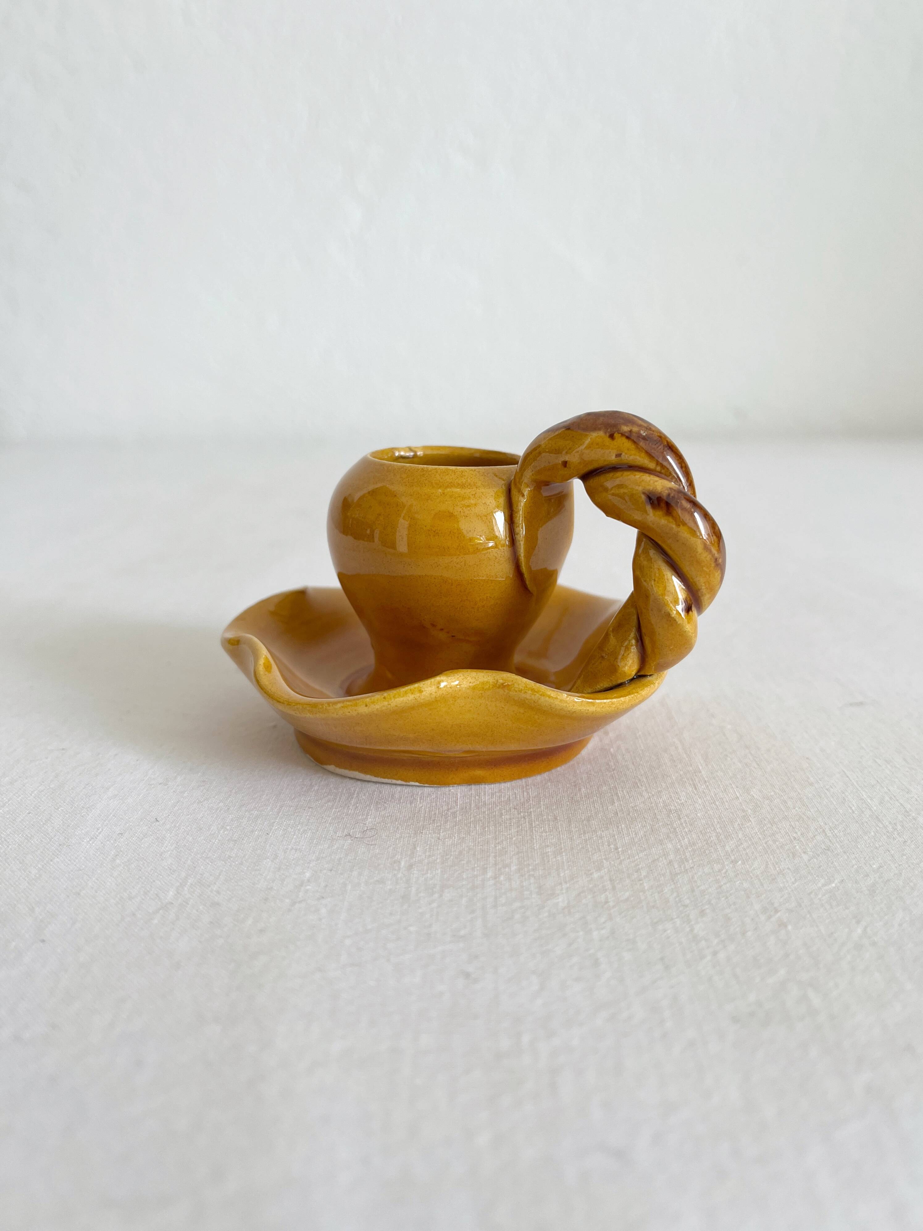 Mustard ceramic candle holder with vintage twisted handle
