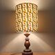 Vintage turned wood lamp, seventies graphic lampshade.