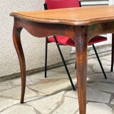 Solid wood table with curved legs