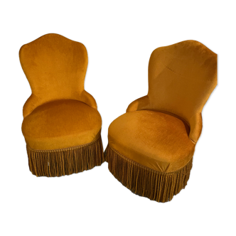 Two small mustard-colored toad armchairs