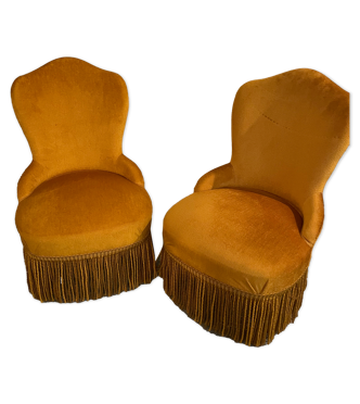 Deux fauteuils crapauds couleur moutarde