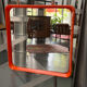 Orange moulded plastic mirror