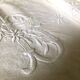 Old embroidered cloth, monograms and lace