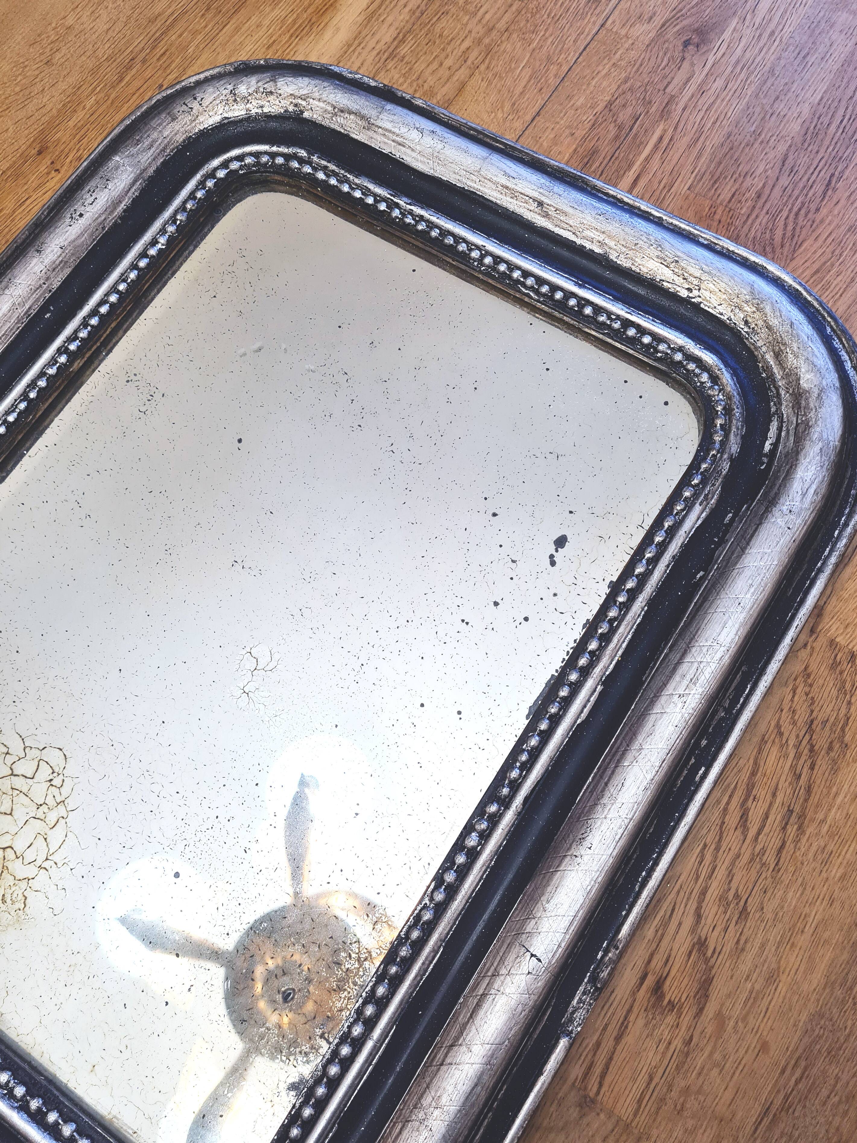 Old Louis Phillipe mirror, silvered with silver leaf.
