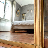 Antique gilded mirror with Louis XV pediment