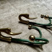 Rare set of swan neck coat hooks with mirror frame attributed to Maison Jansen, France, 1950s.