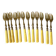 Antique dessert forks in brass and bakelite
