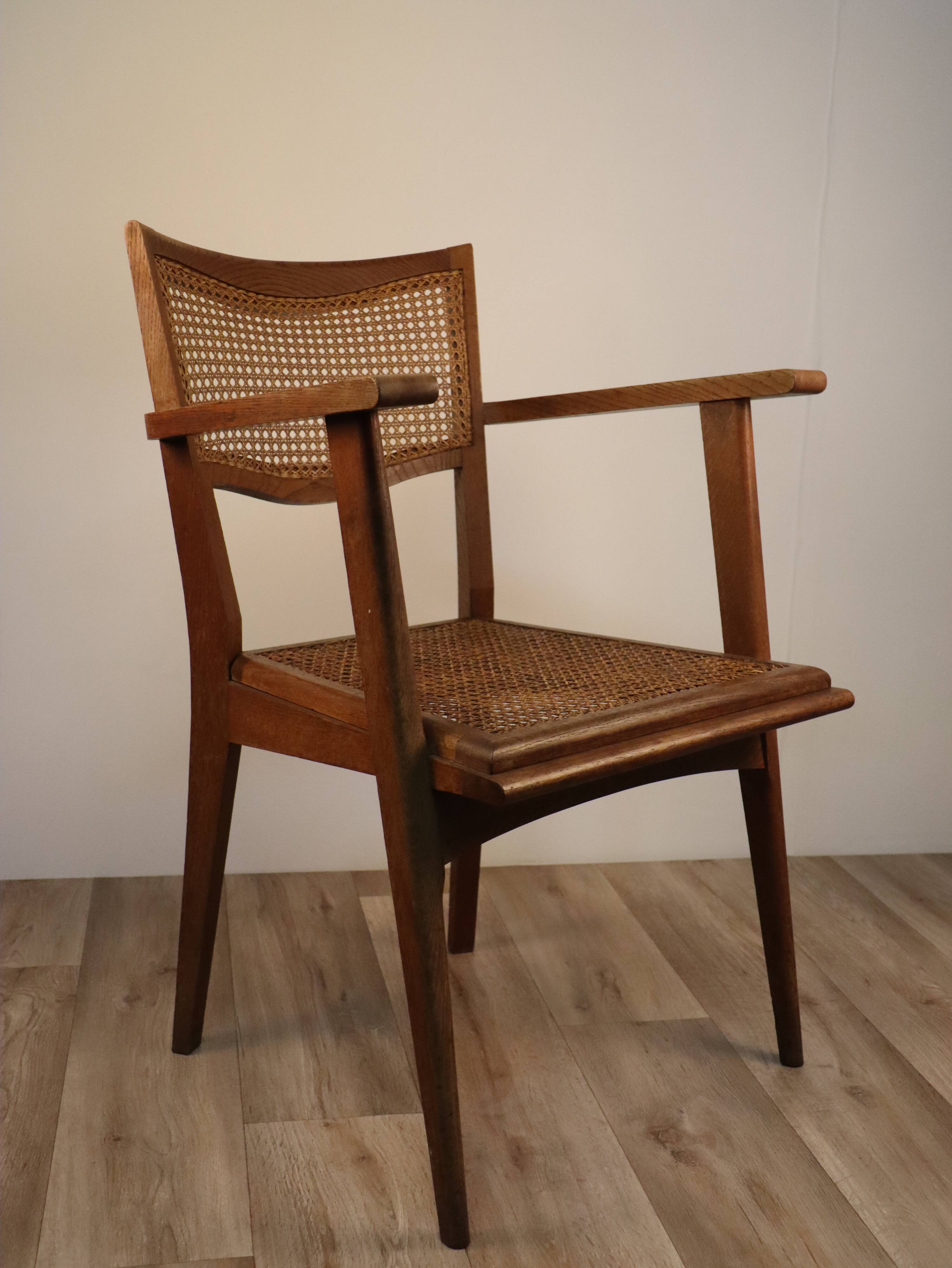 Vintage wooden armchair and canning 1950