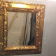 Mirror in gold frame