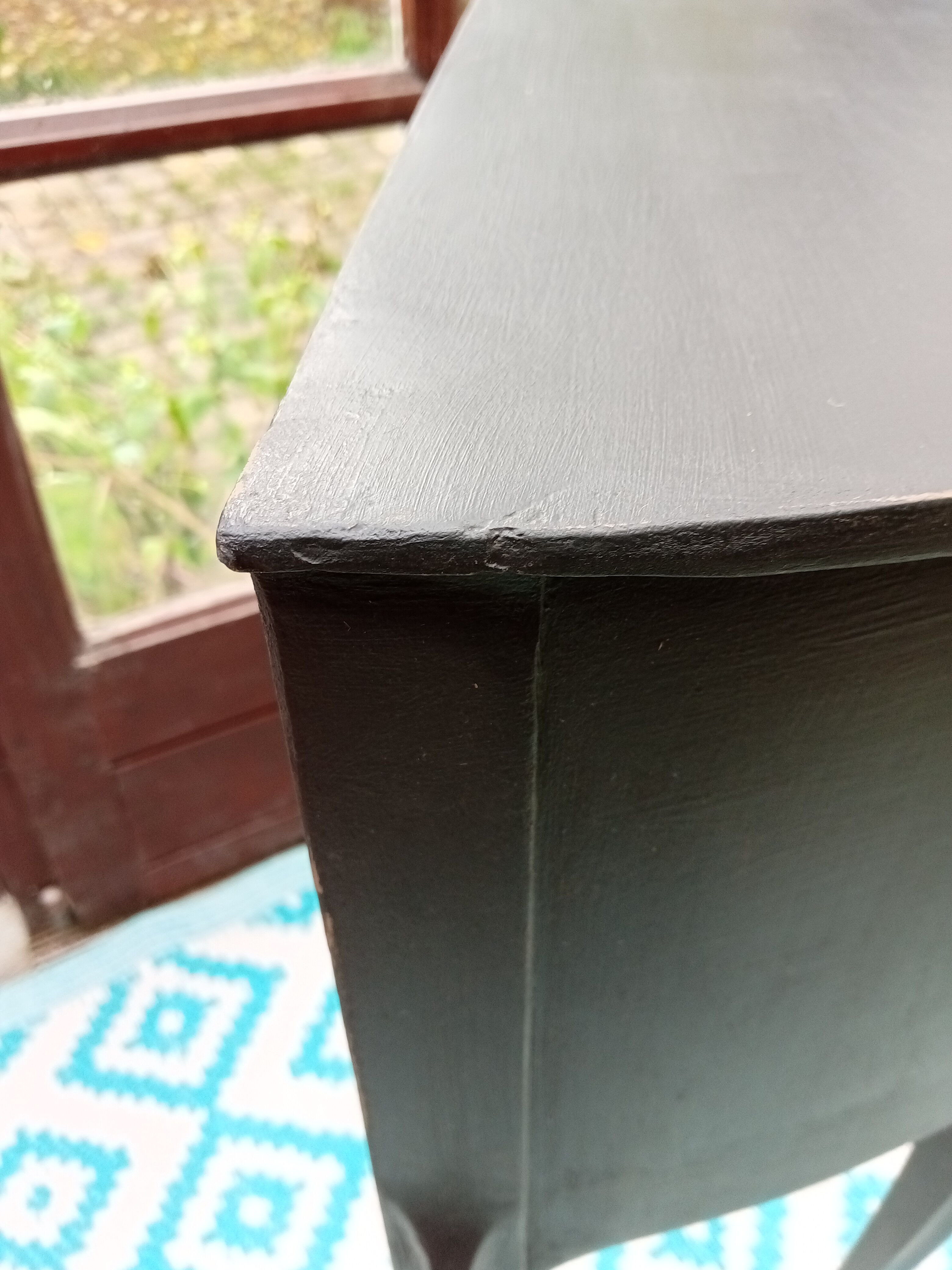 Black patina bedside table