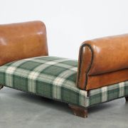 Antique daybed reupholstered with sheepskin and Scottish tartan wool