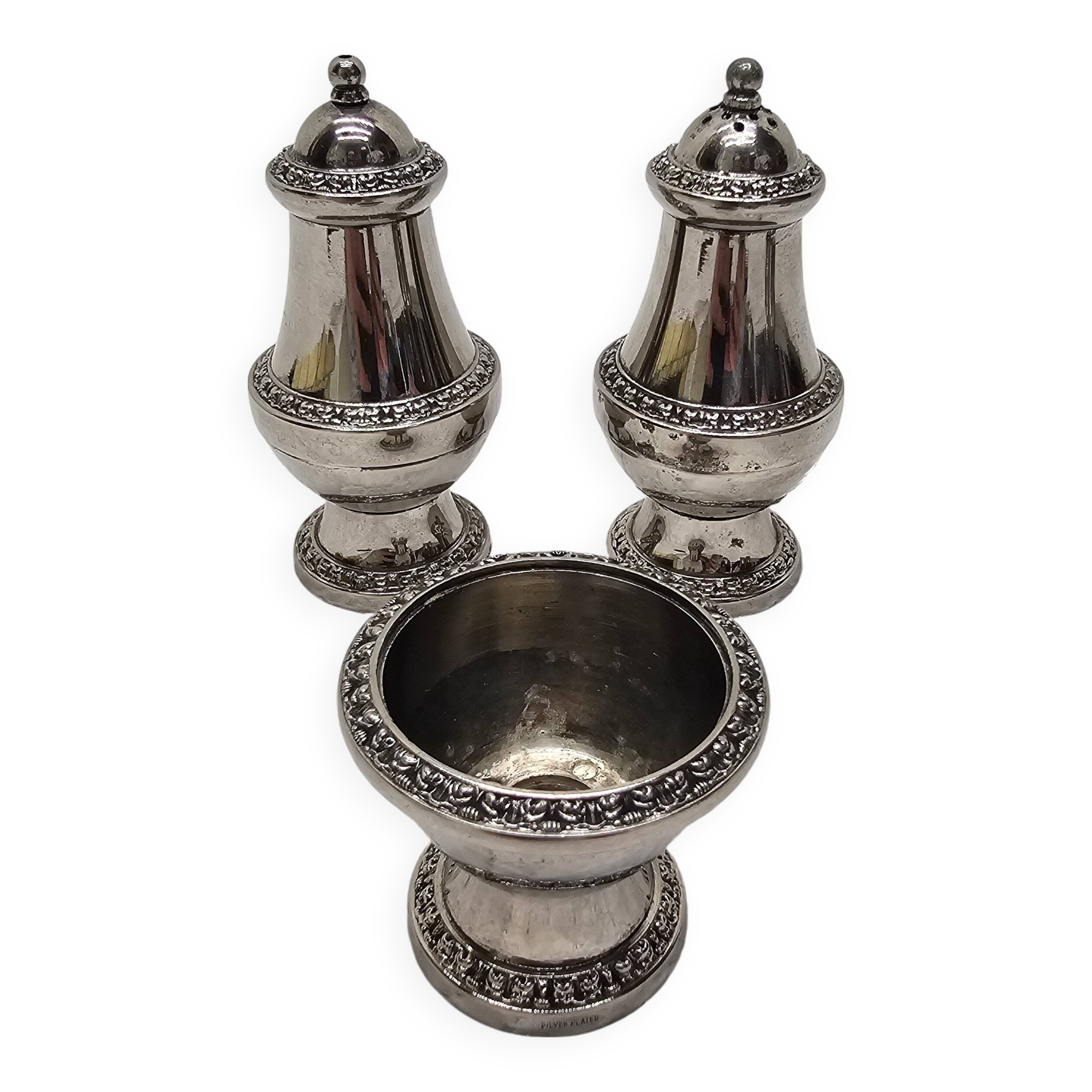 Silver-plated salt and pepper shakers and egg cups
