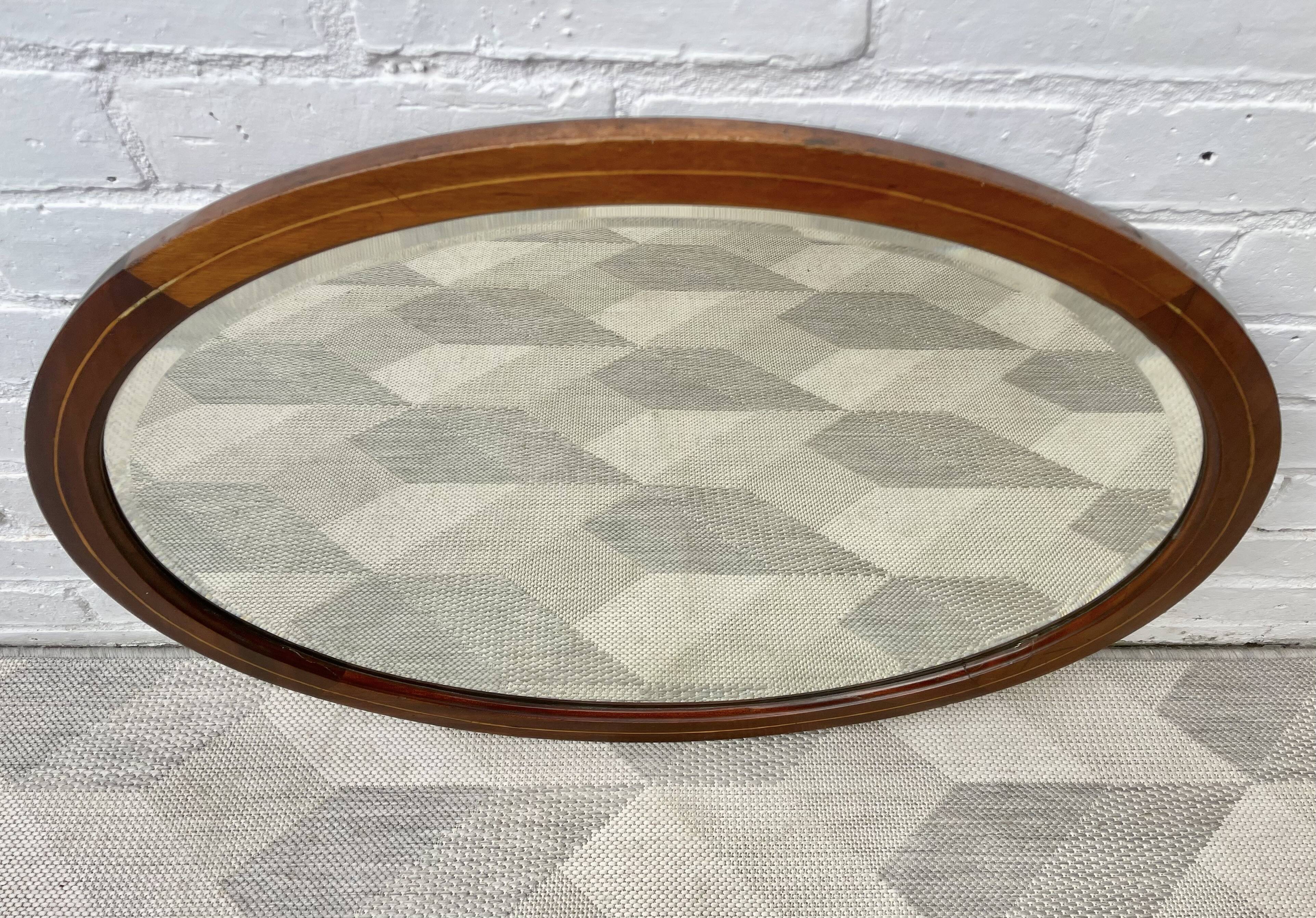 Vintage oval bevelled mirror mahogany frame