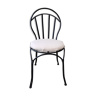 Black iron chairs with beige cotton fabric seat
