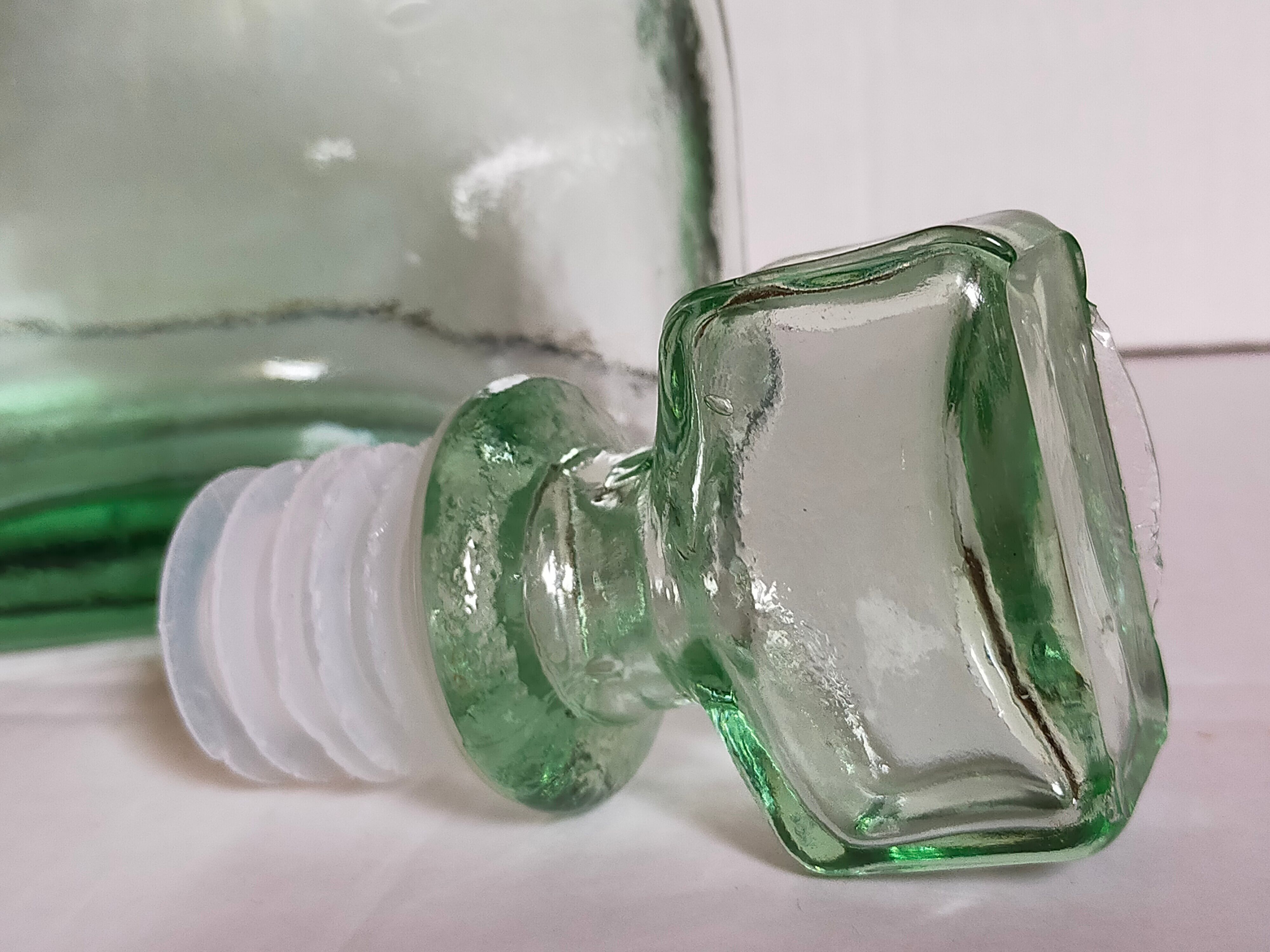 Vintage green glass whiskey decanter