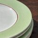 Set of 5 Salins Isoard model plates in vintage green earthenware.