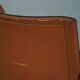 Set of 4 brown/red leather armchairs, Tito Agnoli, modern Italian, 1970s.