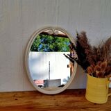 Vintage enamelled metal oval mirror