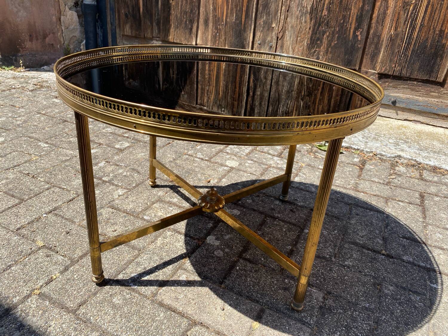 Neoclassical coffee table in black opaline glass and gilt bronze, circa 1970