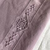 Old linen tablecloth tinted in lilac