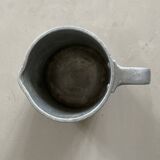 Old aluminum pitcher