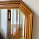Miroir octogonal nervuré en bois doré