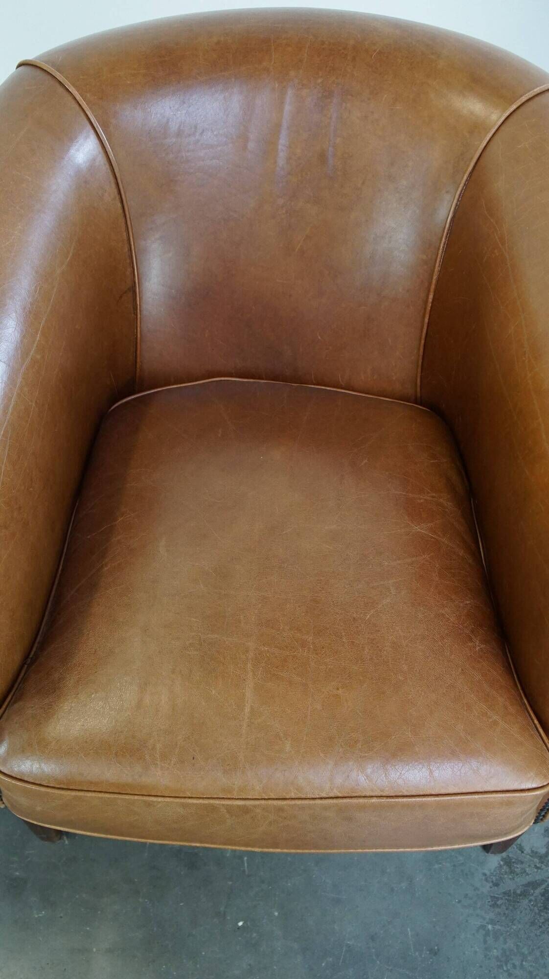 Set of 2 very comfortable light cognac-colored leather club armchairs in English style
