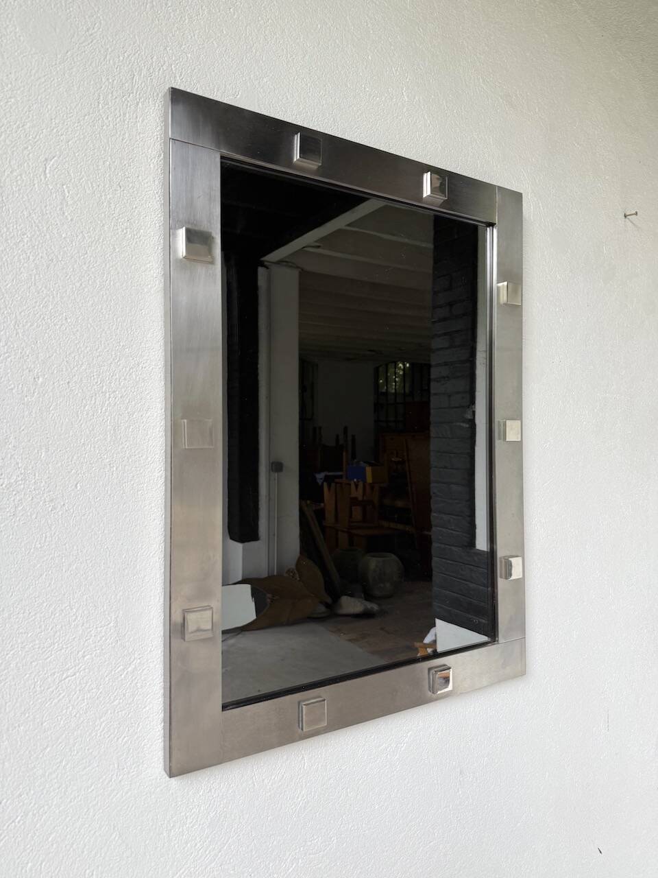 Chrome mirror from the 1970s.