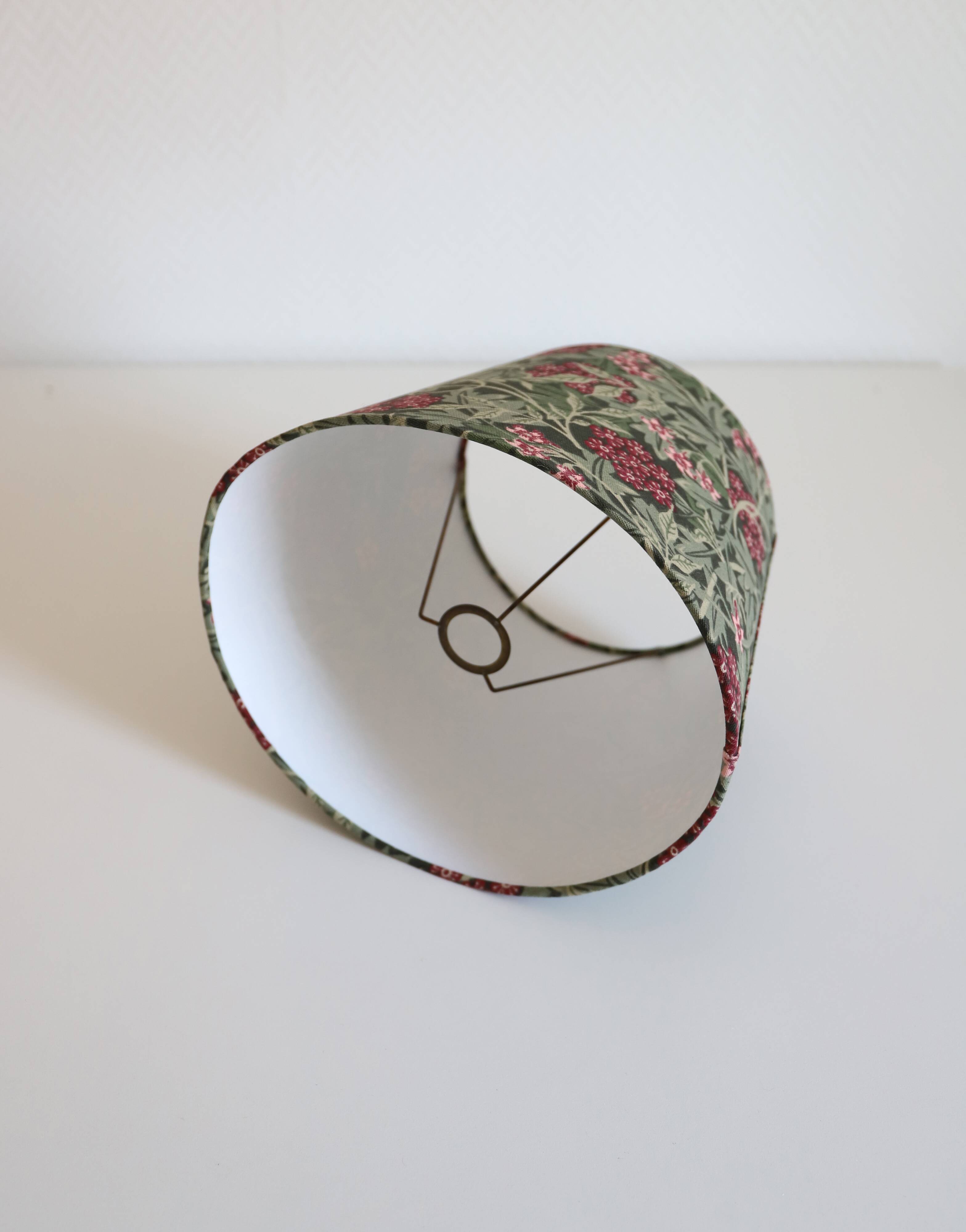 Table lamp, turned wooden base and antique printed lampshade