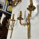 Pair of Louis XV wall lamps in gilded bronze