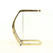 Side table in brass and glass, Italy, 1970.